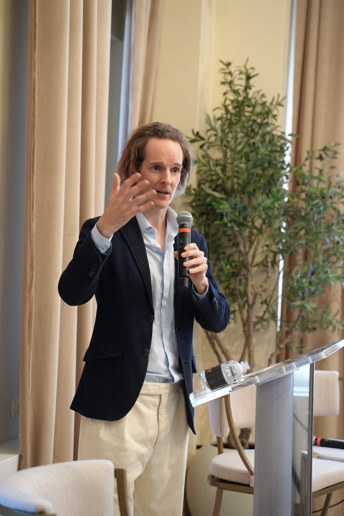 Felix Prehn, economist and former investment banker, speaking at a live Goat Academy presentation