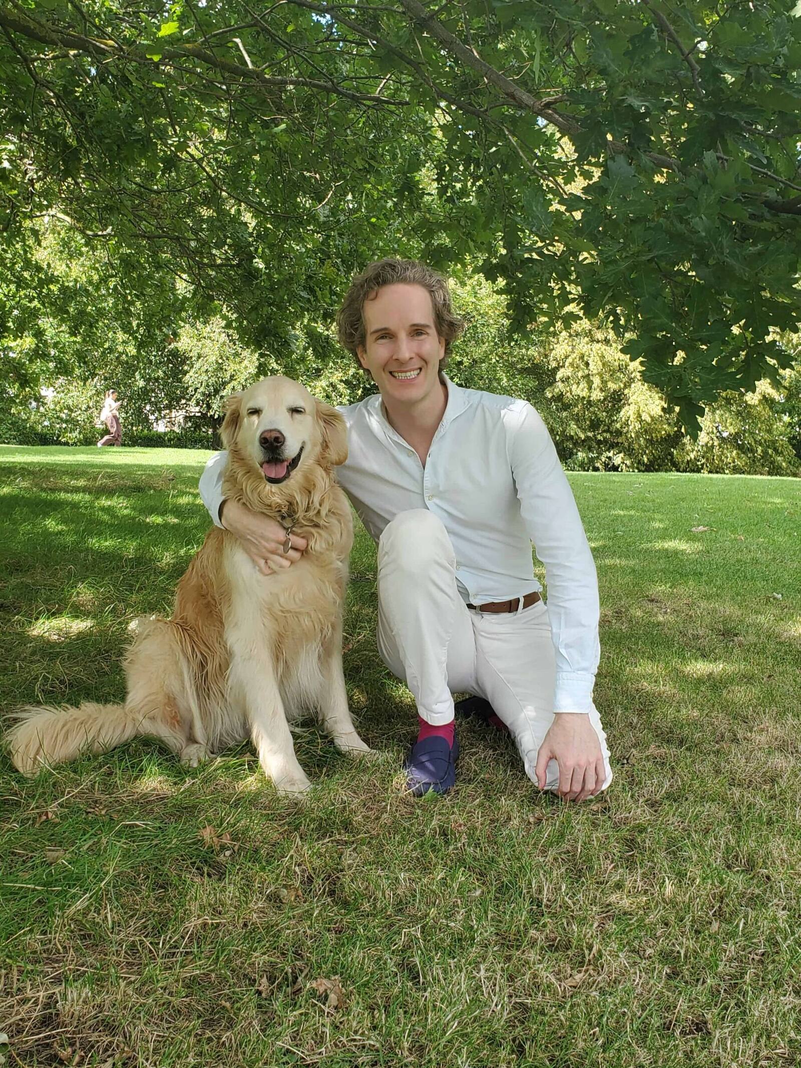 Felix Prehn with his adopted golden retriever Winston