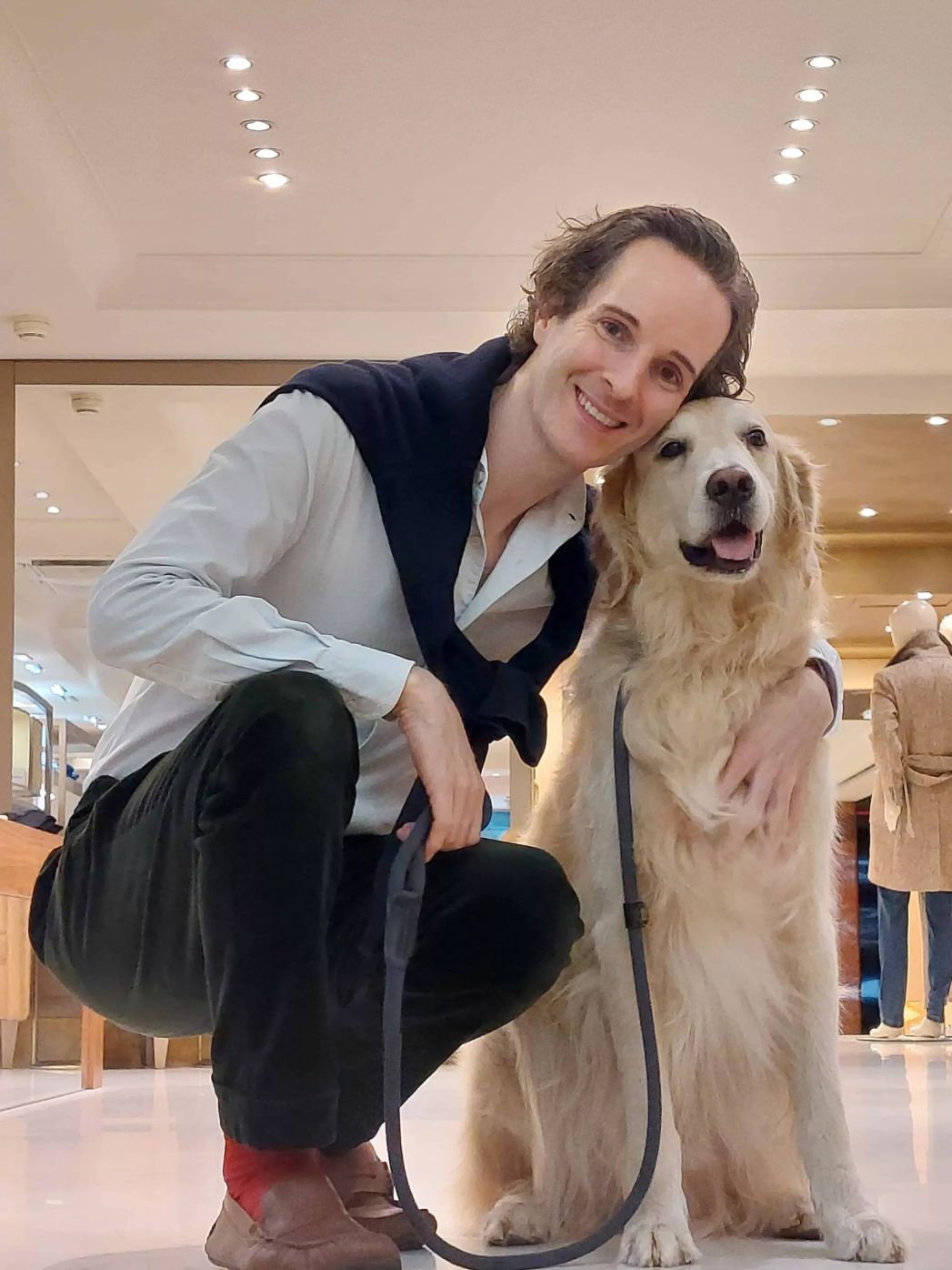 Felix Prehn with his golden retriever Winston