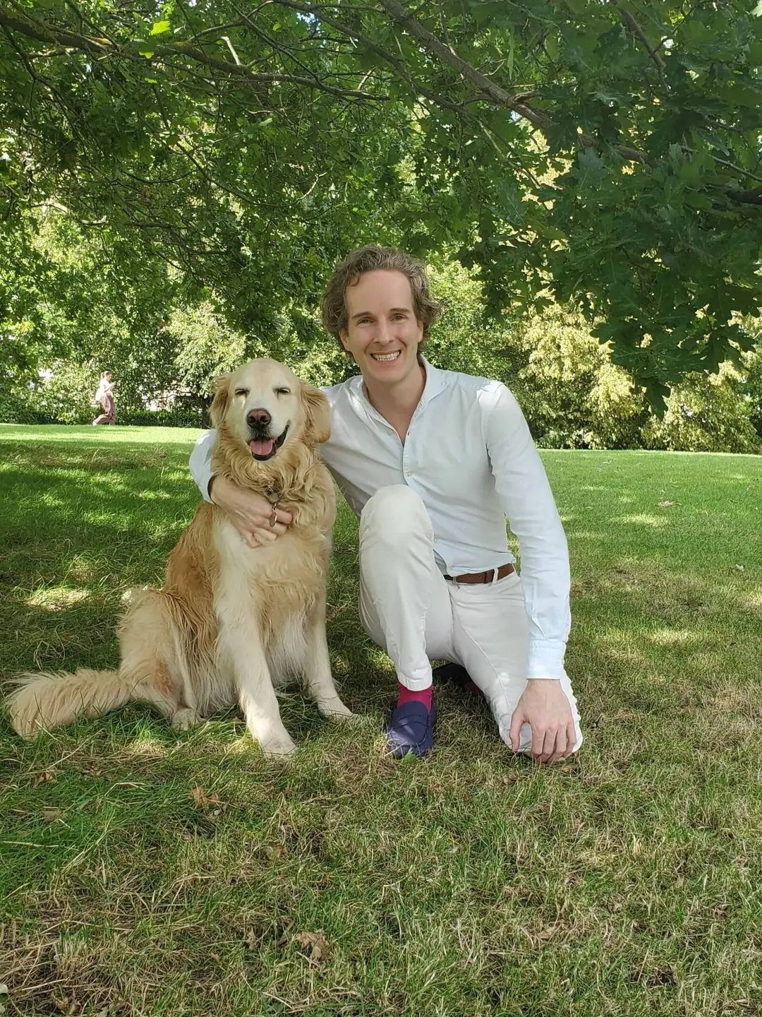 Felix Prehn with his adopted golden retriever Winston